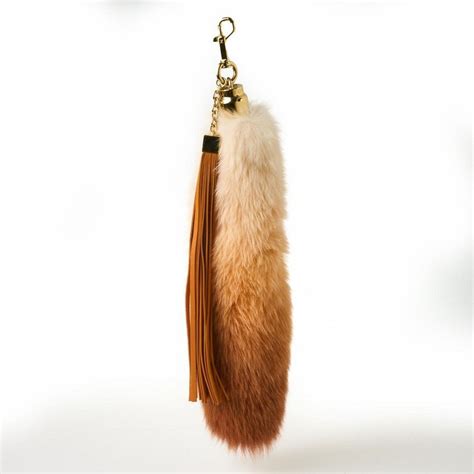 louis vuitton fox tail bag charm